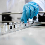 NASA’s Toothpaste Formula Shakes Up Dental World A healthcare professional in a lab preparing vaccine vials