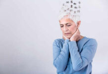 Elderly woman with a unique hairstyle made of puzzle pieces, looking thoughtful