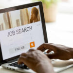 Person using a laptop for job searching