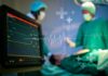 Medical professionals in an operating room monitoring a patient