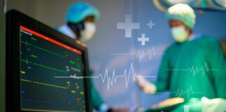 Medical professionals in an operating room monitoring a patient