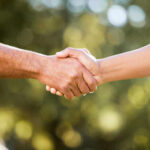 Hidden Health Clue In Your Handshake Two hands shaking in a gesture of agreement