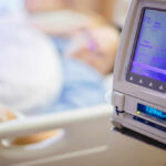 Strange Link Between Vitamin D and Surgery Pain IV pump displaying medication flow rate in a hospital room