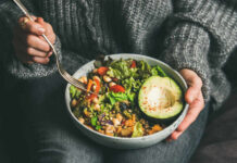 Think you’re eating healthy? You may be missing this Heart Booster A person holding a bowl of colorful salad with avocado and greens