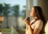 Can Coffee Help Your Liver Fight Disease? Woman enjoying a cup of coffee in a sunlit room