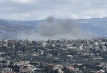 Surprising Villain Behind Rising Smog in US Cities Smoke rising from a city in a mountainous area