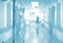 Ebola Miracle In Berlin IV drip in a hospital corridor with a blurred background