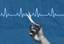 The ‘Good Fat’ That Slashes Your Heart Disease Risk A hand holding scissors above a heartbeat line on a blue background