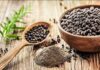 This Grain Could Help Protect Your Brain As You Age Black peppercorns in a wooden bowl and spoon with ground pepper