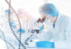 Hair Science Upended: Scientists reveal how human hair really grows Scientist examining samples under a microscope in a laboratory