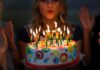 Brain Science Shreds The “Adult at 18” Myth Person blowing out candles on colorful birthday cake