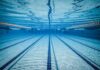 Underwater view of empty swimming pool lanes