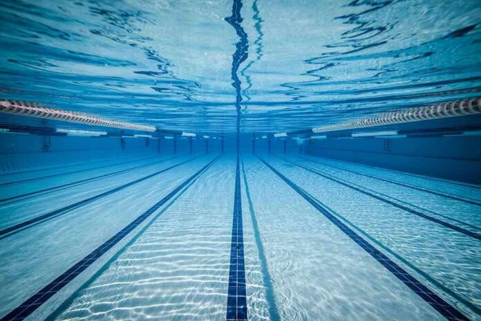 Underwater view of empty swimming pool lanes