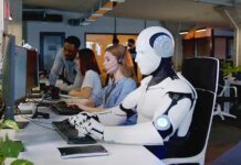 Robot and office workers at computers in a modern workspace