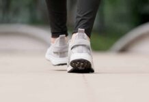 Health Wake-Up: Why Walking Isn’t Enough Close-up of person walking in gray sneakers