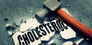 Sledgehammer smashing a tile labeled cholesterol