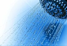 Hot Water Mistake Wrecks Senior Skin Close-up of a shower head with water droplets against a blue background