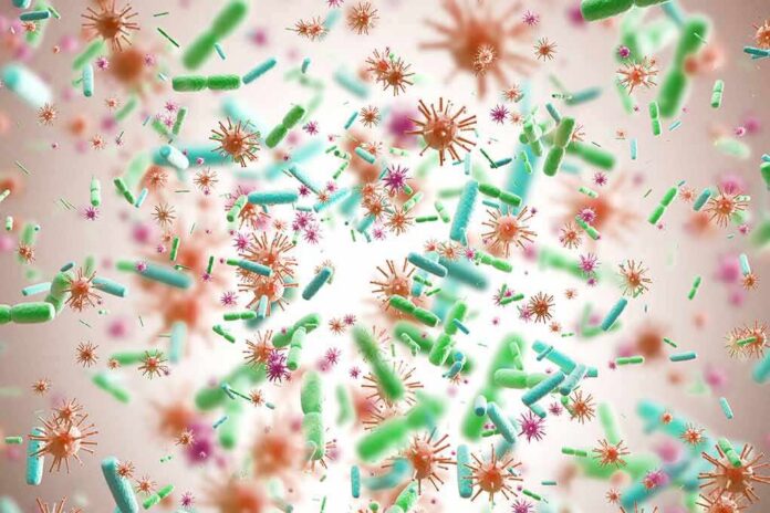 shutterstock_749207107-2 Colorful microscopic bacteria and viruses floating in space