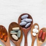 The effect of creatine supplementation on your kidneys Assorted dietary supplements on wooden spoons