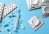 Hormone Therapy Myth – Heart Risk Rises Contraceptives and medications on blue background