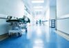 Hospital hallway with empty gurney
