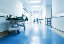 Hospital hallway with empty gurney
