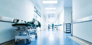 Hospital hallway with empty gurney