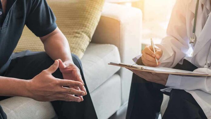 Doctor and patient talking during a consultation