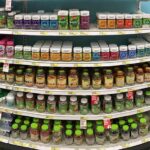 Popular Sleep Gummies’ Hidden Withdrawal Warning Vitamin and supplement bottles on store shelves