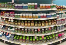 Vitamin and supplement bottles on store shelves